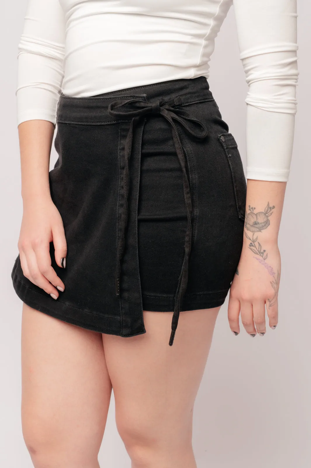 Bentli High Rise Side Tie Denim Skort in Black**