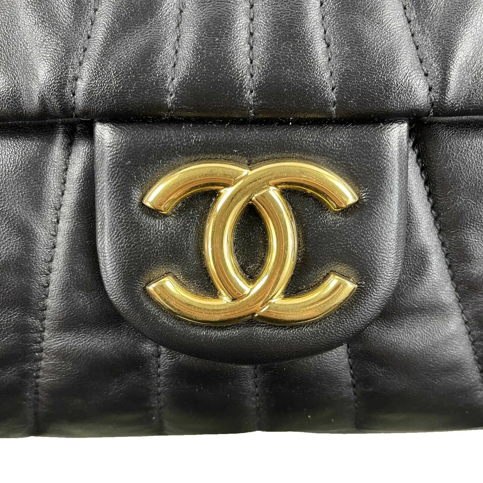 CHANEL - Wave Quilted Black Calfskin Leather Maxi Flap - Gold-tone Shoulder Bag