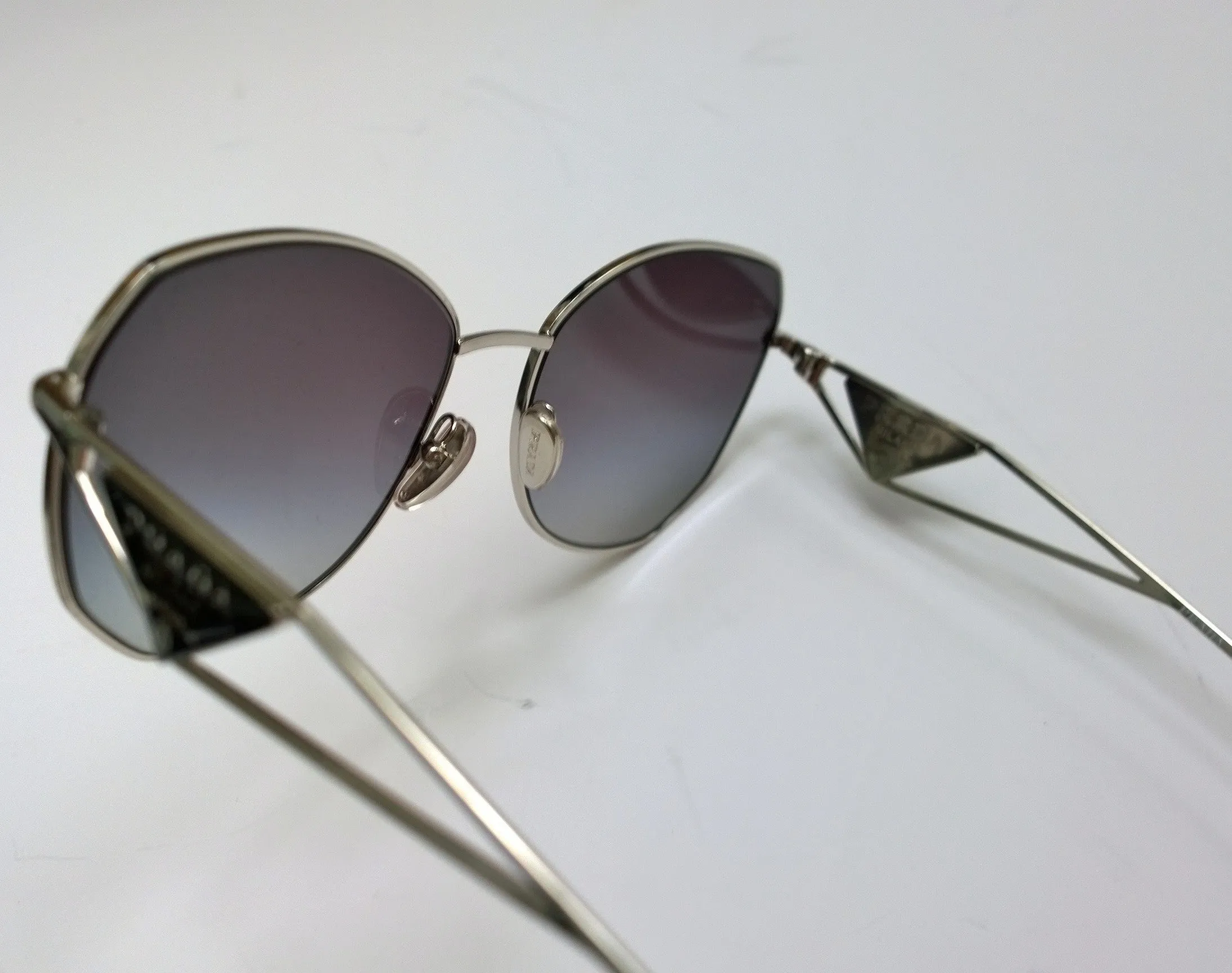 Prada Oversized Geometric Sunglasses in Silver with Triangle Logo Sides