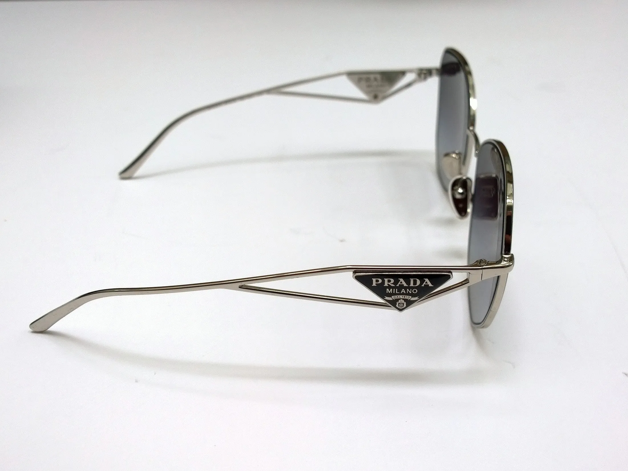 Prada Oversized Geometric Sunglasses in Silver with Triangle Logo Sides